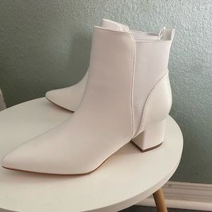 White heeled pointed toe booties